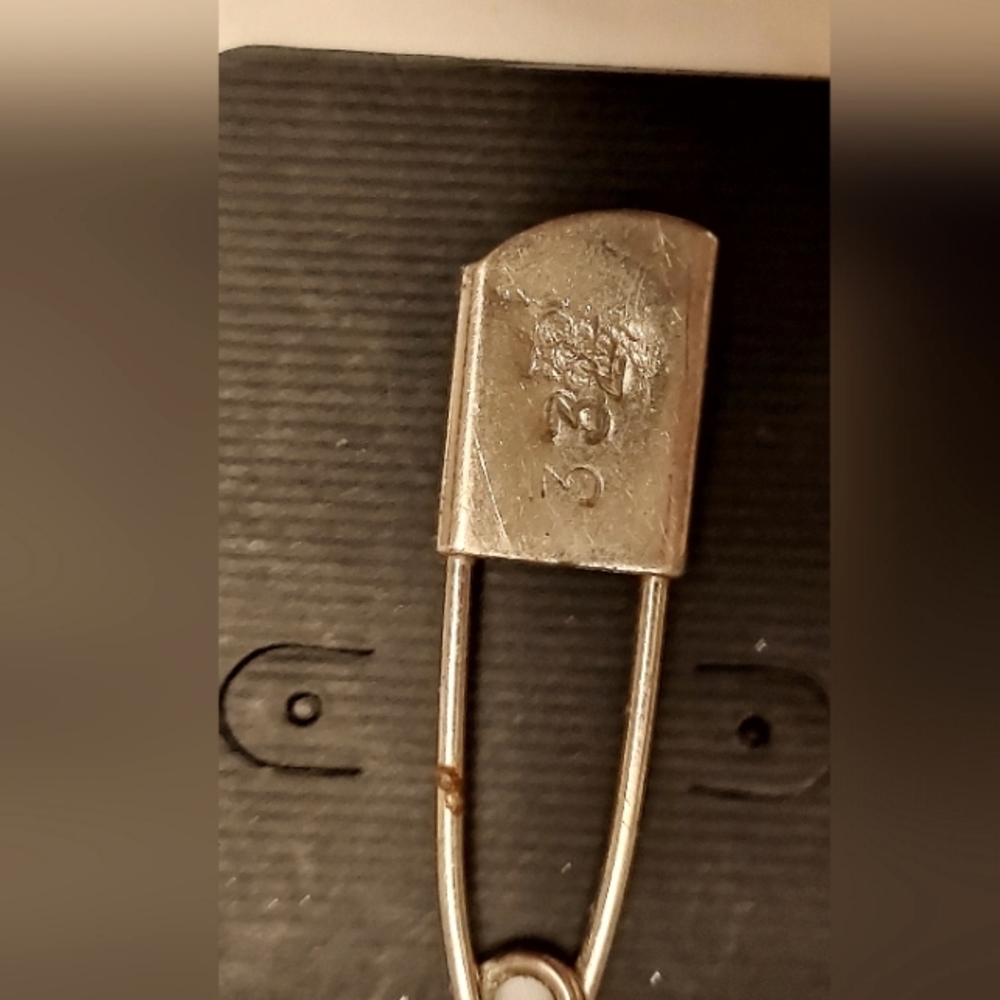 Vintage safety pin with number